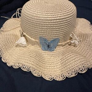 Elegant Beige Sun Hat with Blue Butterfly Accent